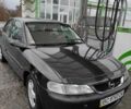 Черный Опель Вектра, объемом двигателя 1.8 л и пробегом 300 тыс. км за 1650 $, фото 1 на Automoto.ua