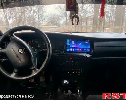 Чорний Опель Вектра, об'ємом двигуна 1.6 л та пробігом 321 тис. км за 2500 $, фото 8 на Automoto.ua