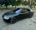 Черный Опель Вектра, объемом двигателя 2.2 л и пробегом 220 тыс. км за 2950 $, фото 1 на Automoto.ua