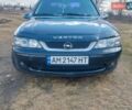 Черный Опель Вектра, объемом двигателя 2.2 л и пробегом 327 тыс. км за 3200 $, фото 1 на Automoto.ua