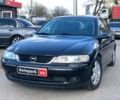 Черный Опель Вектра, объемом двигателя 1.6 л и пробегом 185 тыс. км за 5390 $, фото 1 на Automoto.ua