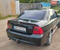 Черный Опель Вектра, объемом двигателя 2.2 л и пробегом 327 тыс. км за 3200 $, фото 3 на Automoto.ua