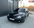 Черный Опель Вектра, объемом двигателя 2.2 л и пробегом 335 тыс. км за 5850 $, фото 1 на Automoto.ua