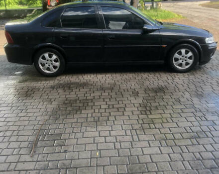 Черный Опель Вектра, объемом двигателя 2.2 л и пробегом 311 тыс. км за 3200 $, фото 1 на Automoto.ua