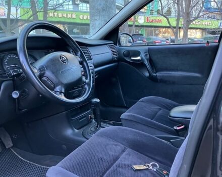 Черный Опель Вектра, объемом двигателя 1.8 л и пробегом 182 тыс. км за 5000 $, фото 21 на Automoto.ua