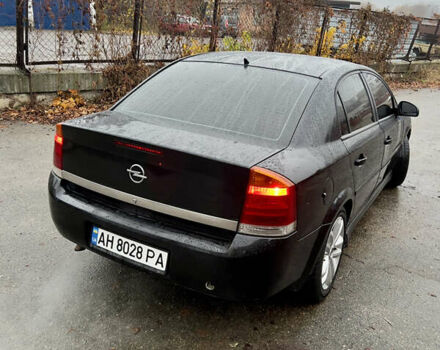 Черный Опель Вектра, объемом двигателя 2.2 л и пробегом 240 тыс. км за 3600 $, фото 4 на Automoto.ua