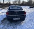 Черный Опель Вектра, объемом двигателя 2.2 л и пробегом 245 тыс. км за 3500 $, фото 2 на Automoto.ua