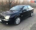 Черный Опель Вектра, объемом двигателя 2.2 л и пробегом 300 тыс. км за 3900 $, фото 1 на Automoto.ua