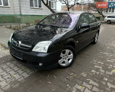 Черный Опель Вектра, объемом двигателя 2.2 л и пробегом 238 тыс. км за 3650 $, фото 6 на Automoto.ua