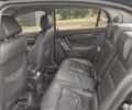 Черный Опель Вектра, объемом двигателя 2.2 л и пробегом 313 тыс. км за 2660 $, фото 10 на Automoto.ua