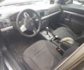 Черный Опель Вектра, объемом двигателя 2.2 л и пробегом 224 тыс. км за 1796 $, фото 2 на Automoto.ua