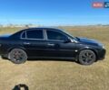 Черный Опель Вектра, объемом двигателя 2.2 л и пробегом 340 тыс. км за 5800 $, фото 1 на Automoto.ua
