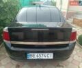 Черный Опель Вектра, объемом двигателя 2.2 л и пробегом 325 тыс. км за 4500 $, фото 4 на Automoto.ua