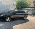 Черный Опель Вектра, объемом двигателя 2.2 л и пробегом 292 тыс. км за 7654 $, фото 1 на Automoto.ua