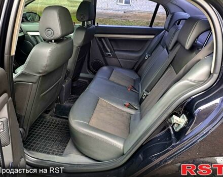 Черный Опель Вектра, объемом двигателя 2.2 л и пробегом 185 тыс. км за 5550 $, фото 10 на Automoto.ua