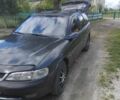 Чорний Опель Вектра, об'ємом двигуна 2 л та пробігом 352 тис. км за 1750 $, фото 1 на Automoto.ua