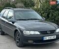 Черный Опель Вектра, объемом двигателя 1.8 л и пробегом 420 тыс. км за 1999 $, фото 1 на Automoto.ua