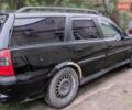 Черный Опель Вектра, объемом двигателя 1.8 л и пробегом 350 тыс. км за 1000 $, фото 10 на Automoto.ua