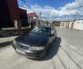 Черный Опель Вектра, объемом двигателя 2 л и пробегом 400 тыс. км за 600 $, фото 1 на Automoto.ua