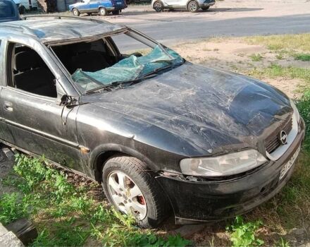 Черный Опель Вектра, объемом двигателя 1.8 л и пробегом 275 тыс. км за 1200 $, фото 2 на Automoto.ua