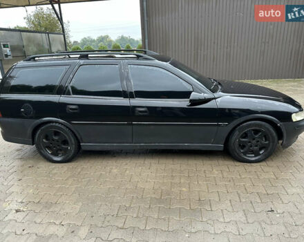 Черный Опель Вектра, объемом двигателя 2 л и пробегом 300 тыс. км за 1000 $, фото 1 на Automoto.ua