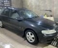 Черный Опель Вектра, объемом двигателя 1.8 л и пробегом 367 тыс. км за 2000 $, фото 1 на Automoto.ua
