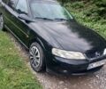 Черный Опель Вектра, объемом двигателя 1.8 л и пробегом 251 тыс. км за 1650 $, фото 1 на Automoto.ua