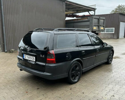 Черный Опель Вектра, объемом двигателя 2 л и пробегом 300 тыс. км за 1000 $, фото 2 на Automoto.ua