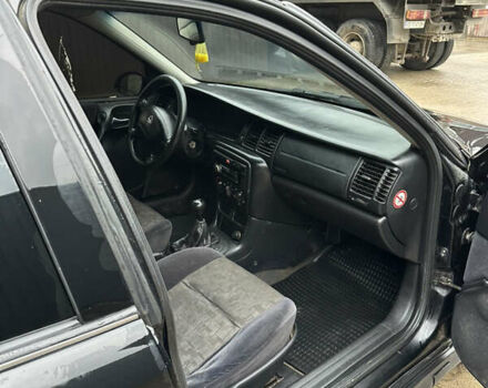 Черный Опель Вектра, объемом двигателя 2 л и пробегом 300 тыс. км за 1000 $, фото 10 на Automoto.ua