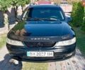 Чорний Опель Вектра, об'ємом двигуна 2 л та пробігом 325 тис. км за 2500 $, фото 5 на Automoto.ua