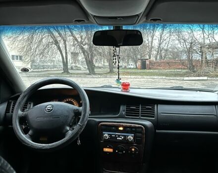 Черный Опель Вектра, объемом двигателя 2 л и пробегом 300 тыс. км за 1800 $, фото 7 на Automoto.ua