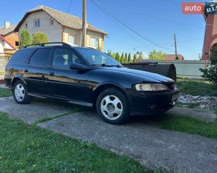 Чорний Опель Вектра, об'ємом двигуна 2 л та пробігом 300 тис. км за 1999 $, фото 1 на Automoto.ua