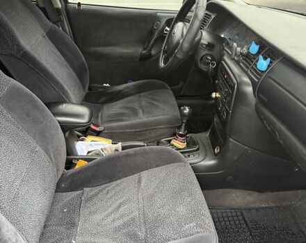 Черный Опель Вектра, объемом двигателя 2 л и пробегом 355 тыс. км за 3600 $, фото 8 на Automoto.ua