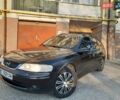 Чорний Опель Вектра, об'ємом двигуна 2 л та пробігом 370 тис. км за 2000 $, фото 2 на Automoto.ua