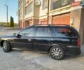 Чорний Опель Вектра, об'ємом двигуна 2 л та пробігом 370 тис. км за 2000 $, фото 4 на Automoto.ua