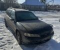 Черный Опель Вектра, объемом двигателя 2 л и пробегом 350 тыс. км за 1550 $, фото 1 на Automoto.ua