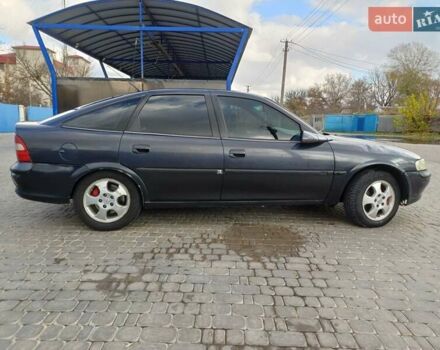 Черный Опель Вектра, объемом двигателя 2.5 л и пробегом 382 тыс. км за 3500 $, фото 2 на Automoto.ua