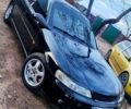 Черный Опель Вектра, объемом двигателя 2 л и пробегом 200 тыс. км за 3400 $, фото 1 на Automoto.ua