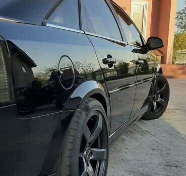 Чорний Опель Вектра, об'ємом двигуна 2.8 л та пробігом 230 тис. км за 9000 $, фото 1 на Automoto.ua