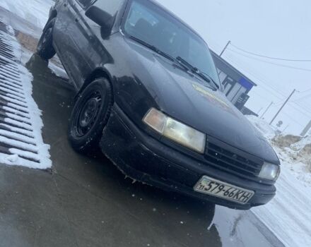 Черный Опель Вектра, объемом двигателя 1.8 л и пробегом 344 тыс. км за 650 $, фото 1 на Automoto.ua