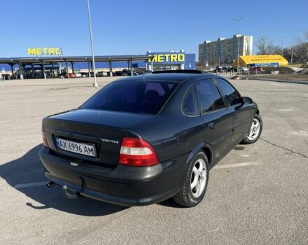 Черный Опель Вектра, объемом двигателя 1.6 л и пробегом 240 тыс. км за 2000 $, фото 1 на Automoto.ua