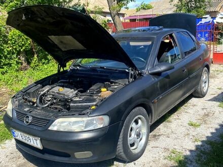 Чорний Опель Вектра, об'ємом двигуна 2 л та пробігом 410 тис. км за 1600 $, фото 1 на Automoto.ua
