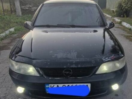 Чорний Опель Вектра, об'ємом двигуна 2 л та пробігом 270 тис. км за 2309 $, фото 1 на Automoto.ua