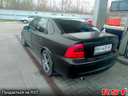 Черный Опель Вектра, объемом двигателя 2 л и пробегом 300 тыс. км за 2500 $, фото 1 на Automoto.ua