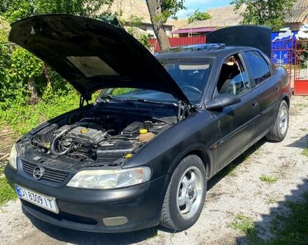 Черный Опель Вектра, объемом двигателя 2 л и пробегом 410 тыс. км за 1600 $, фото 1 на Automoto.ua