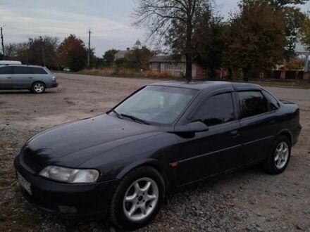 Черный Опель Вектра, объемом двигателя 0 л и пробегом 340 тыс. км за 2400 $, фото 1 на Automoto.ua