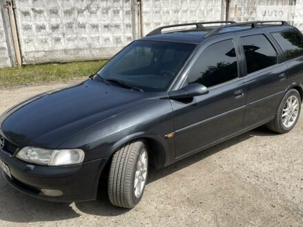 Чорний Опель Вектра, об'ємом двигуна 2 л та пробігом 344 тис. км за 4300 $, фото 1 на Automoto.ua