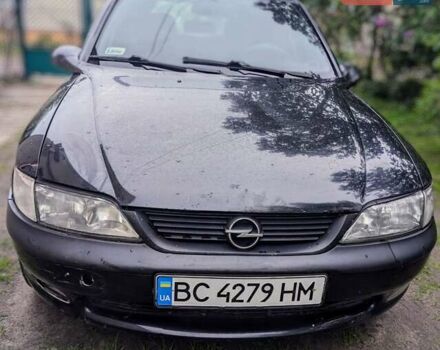 Черный Опель Вектра, объемом двигателя 1.8 л и пробегом 350 тыс. км за 1000 $, фото 1 на Automoto.ua