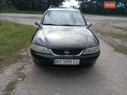 Черный Опель Вектра, объемом двигателя 1.6 л и пробегом 320 тыс. км за 2000 $, фото 1 на Automoto.ua