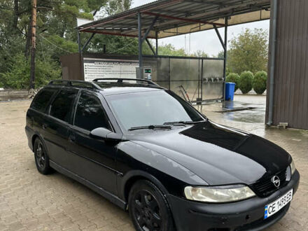 Черный Опель Вектра, объемом двигателя 2 л и пробегом 300 тыс. км за 1000 $, фото 1 на Automoto.ua